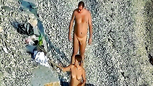 Fat man gets his cock sucked by his thinner wife on the beach before having sex with her